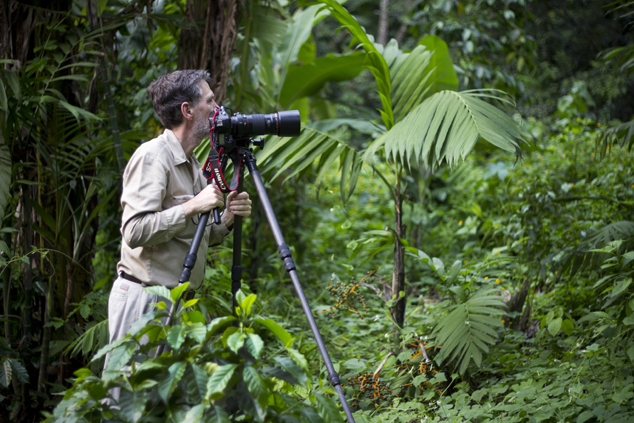 Nicholas photographing pacaya male tree with a Canon EOs 1Ds Mark III and 180mm macro lens. Palín Escuintla Guatemala April 2011