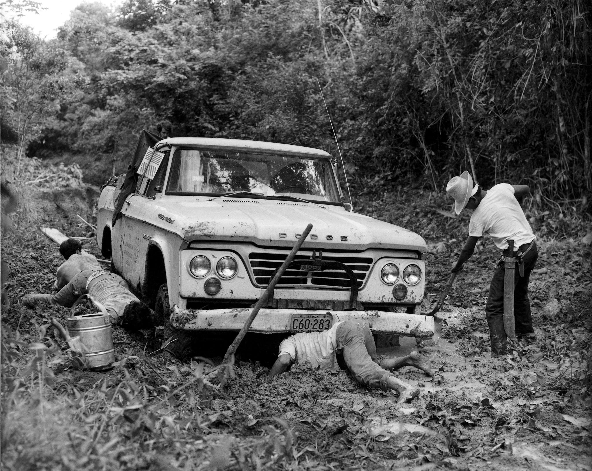 35ek-Yaxha-to-Nakum-4WD-Dodge-PowerWagon-pickup-in-mud-1970s-BW